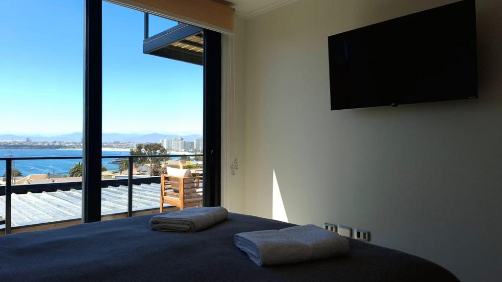 Ένα ή περισσότερα κρεβάτια σε δωμάτιο στο Nuevas Casas Familiares