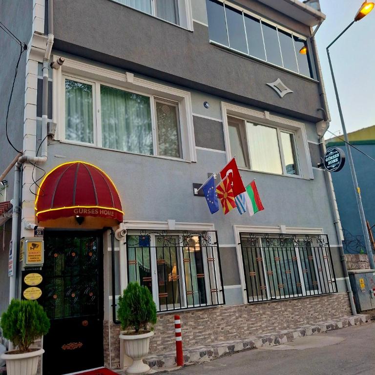 a building with a restaurant on the street at Gürses Home in Edirne