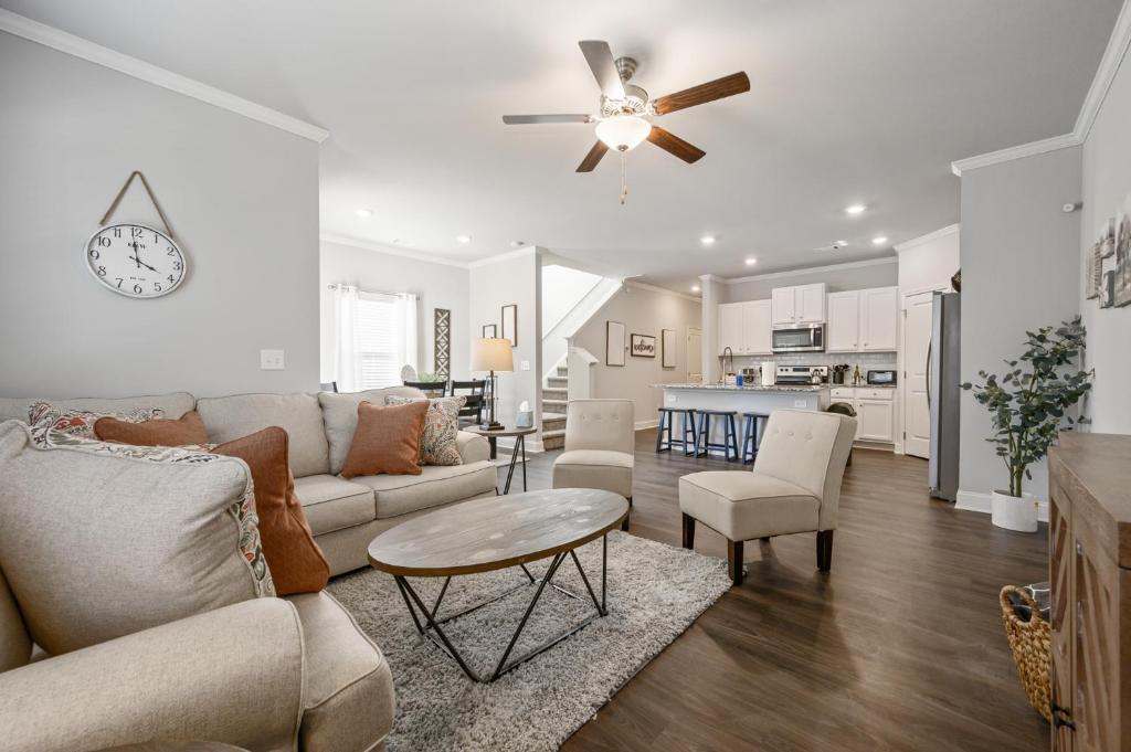 a living room with a couch and a table at 2059 Pinnacle Walk Drive Norcross in Norcross