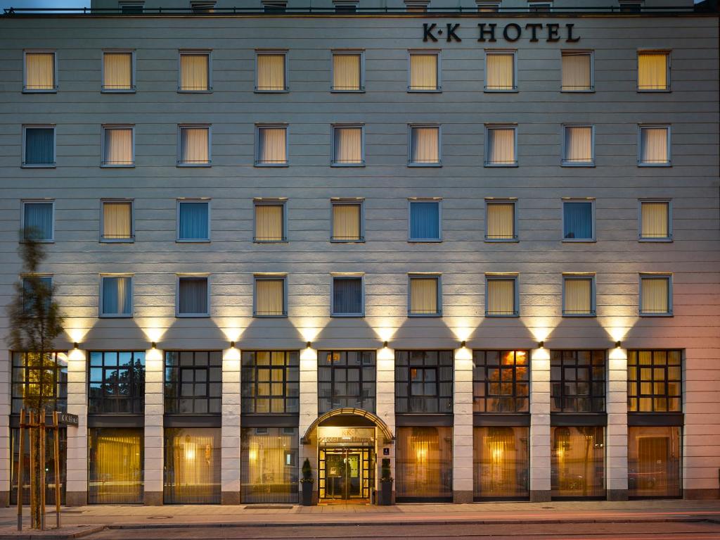 a large building with a lot of windows in front of it at K+K Hotel am Harras in Munich
