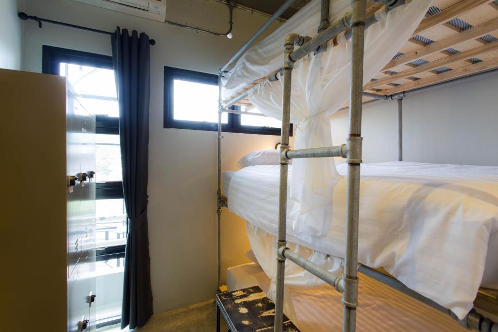 Postel nebo postele na pokoji v ubytování Bloo Hostel