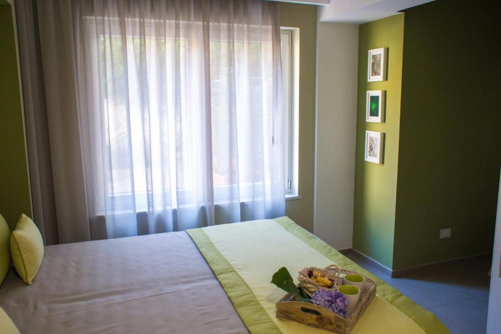 Postel nebo postele na pokoji v ubytování Relais del Corso