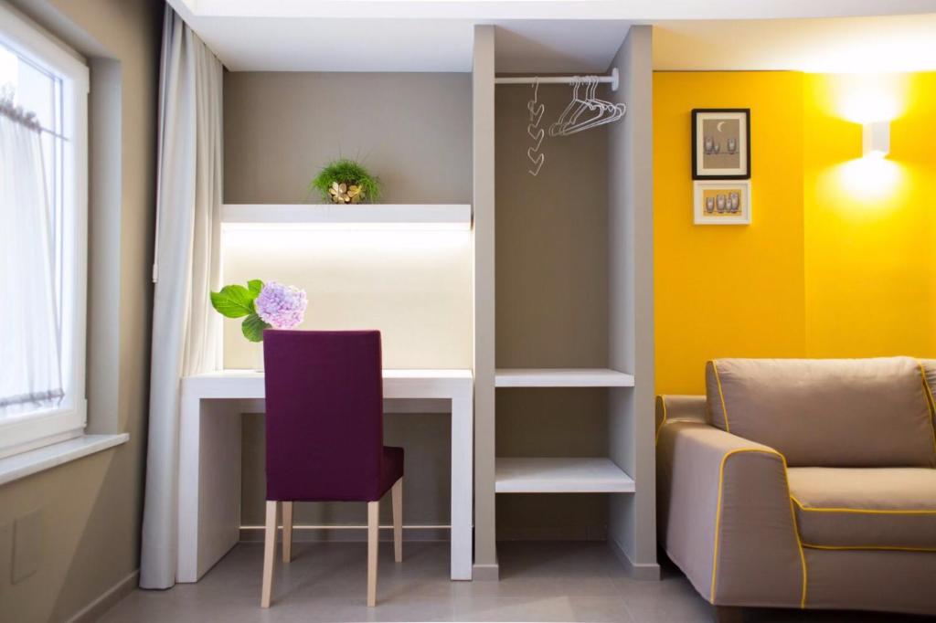 Posezení v ubytování Relais del Corso