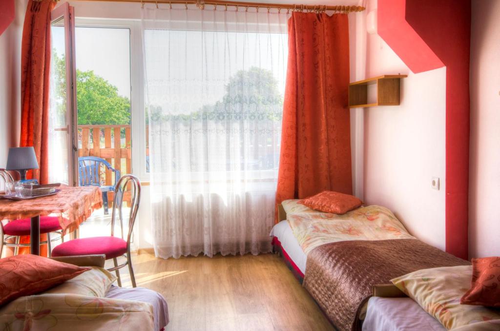 Postel nebo postele na pokoji v ubytování Zibi i Pod Topolami