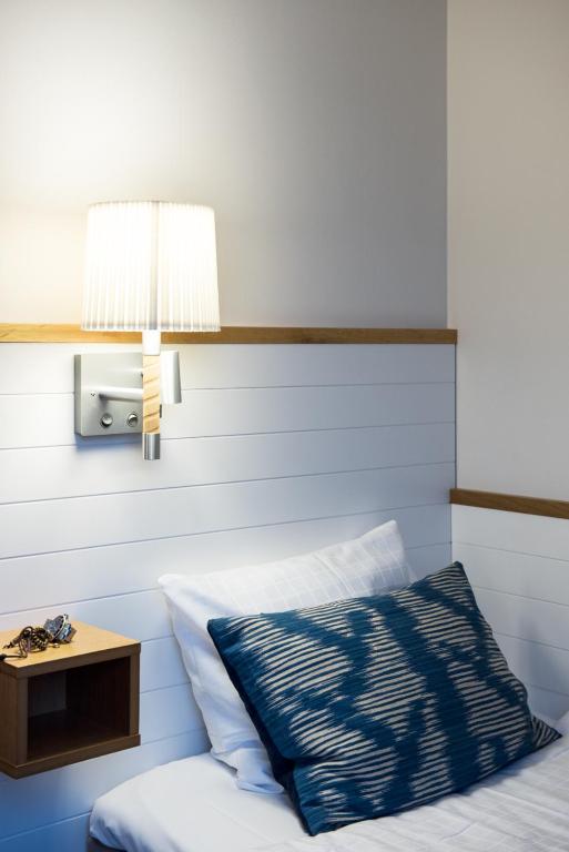 Postel nebo postele na pokoji v ubytování Home Hotel Smedjan