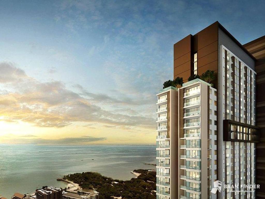 Una representación de un edificio alto con vista al océano. en Large High Floor, Best Pool and Great Location, en Pattaya South