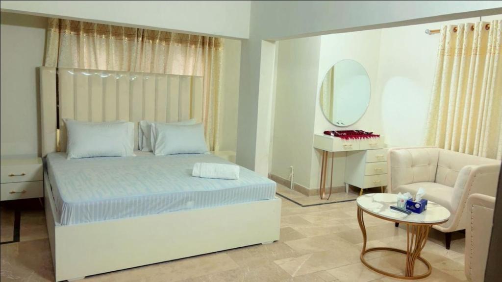 Postel nebo postele na pokoji v ubytování Hotel Moon River