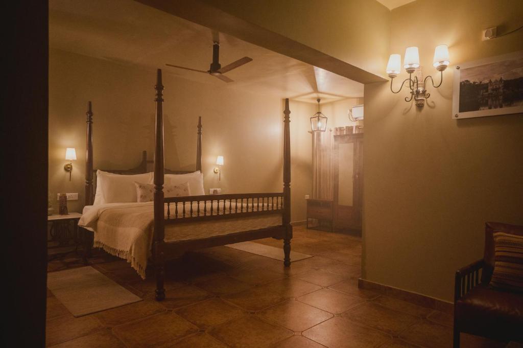 Postel nebo postele na pokoji v ubytování Brij Paraiso Saligao, Goa - An Indo-Portuguese Villa