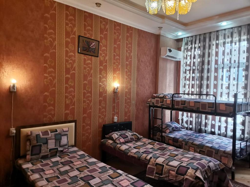 Ένα ή περισσότερα κρεβάτια σε δωμάτιο στο Baku Hostel