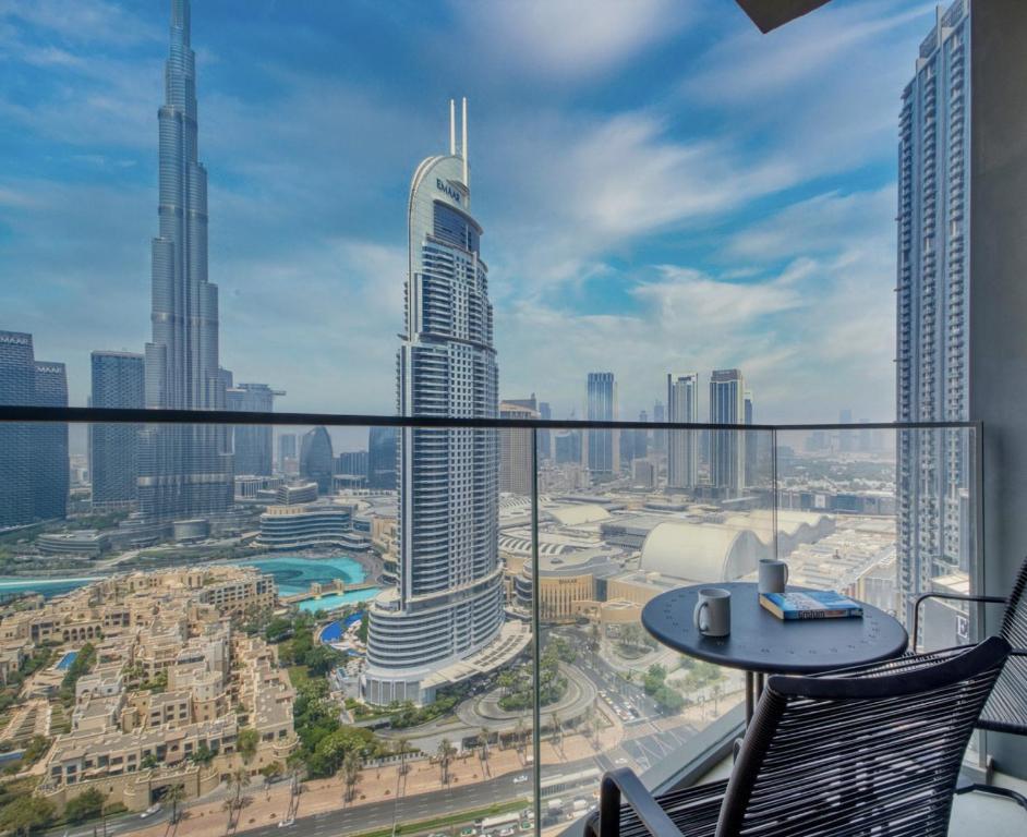 Hotel Burj Royale - Luxury Stay with Panoramic Burj Khalifa & Fountain View, a view of a city from the balcony of a building at Burj Royale - Luxury Stay with Panoramic Burj Khalifa & Fountain View in Dubai