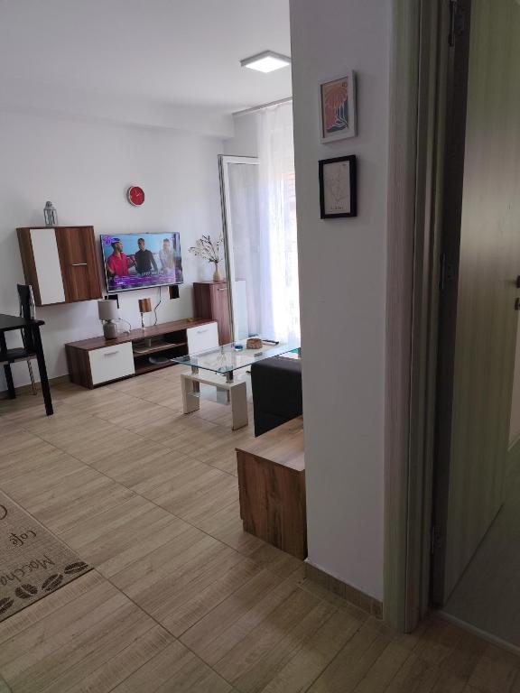 a living room with a couch and a table at Bili 3 in Paraćin