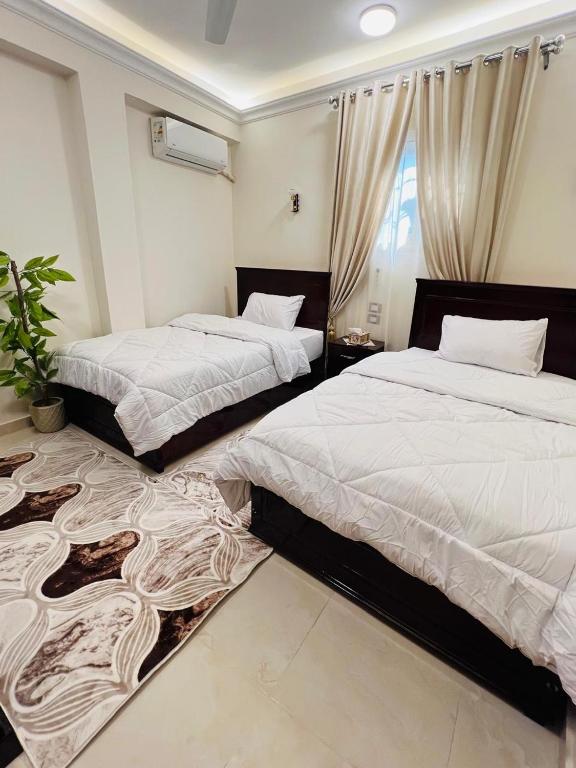 En eller flere senge i et værelse på Fontana Guste house