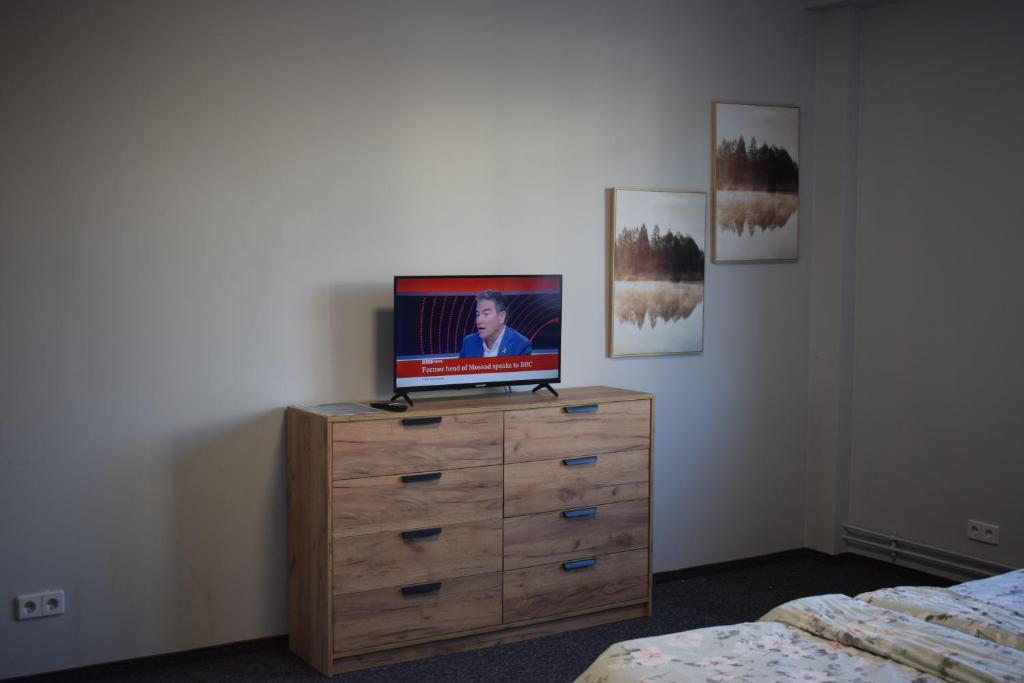 TV/trung tâm giải trí tại Cozy Rooms Apartment Białystok