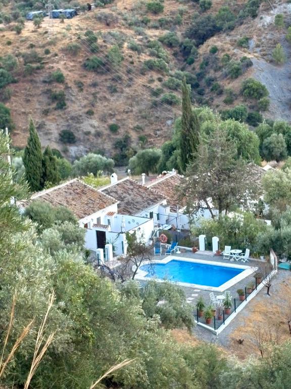 an aerial view of a house with a swimming pool at La Casilla- La Almona Chica in El Chorro