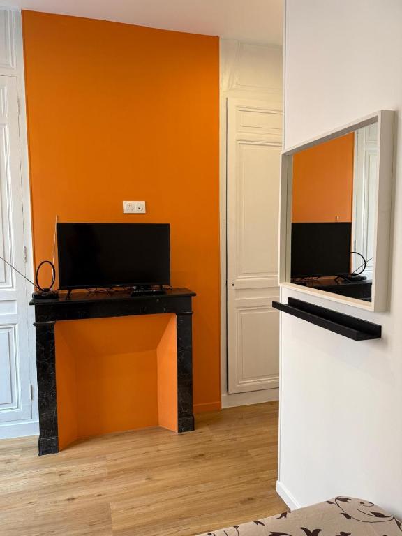 Μια τηλεόραση ή/και κέντρο ψυχαγωγίας στο Appartement Magnifique