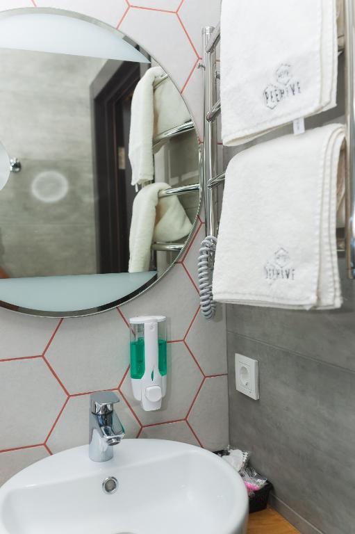 Koupelna v ubytování Beehive Hotel