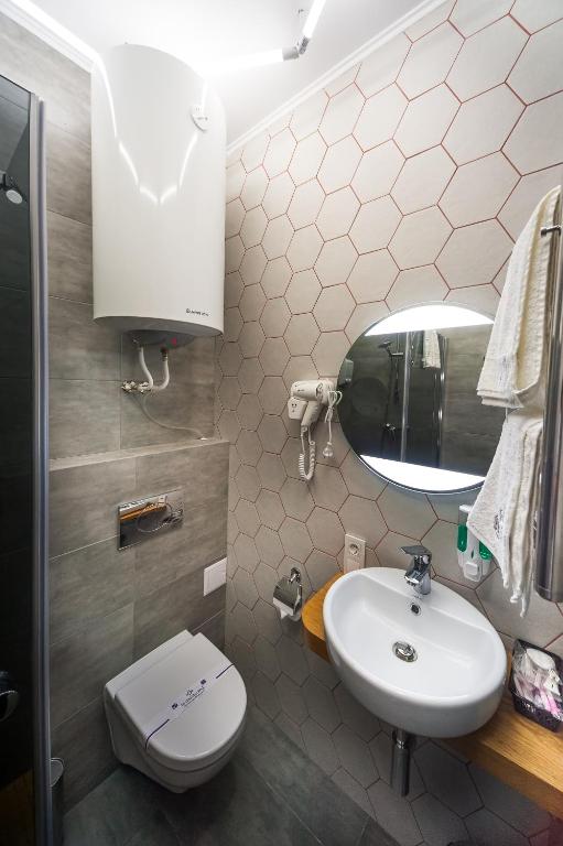 Koupelna v ubytování Beehive Hotel