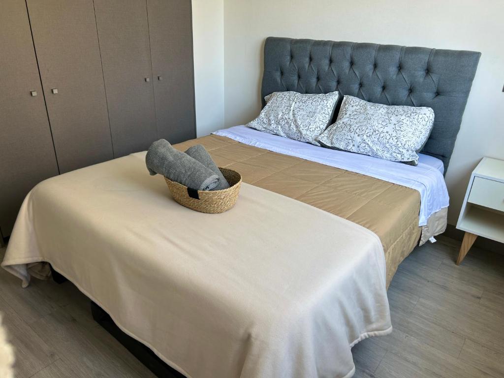 Ένα ή περισσότερα κρεβάτια σε δωμάτιο στο 2H1B I Ñuñoa I Con Estacionamiento