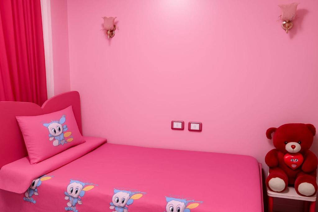 Ένα ή περισσότερα κρεβάτια σε δωμάτιο στο Marhaba