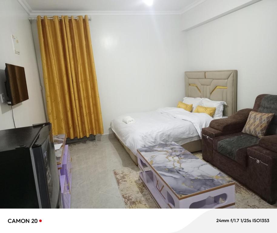 Un televizor și/sau centru de divertisment la Prift Royal Apartments