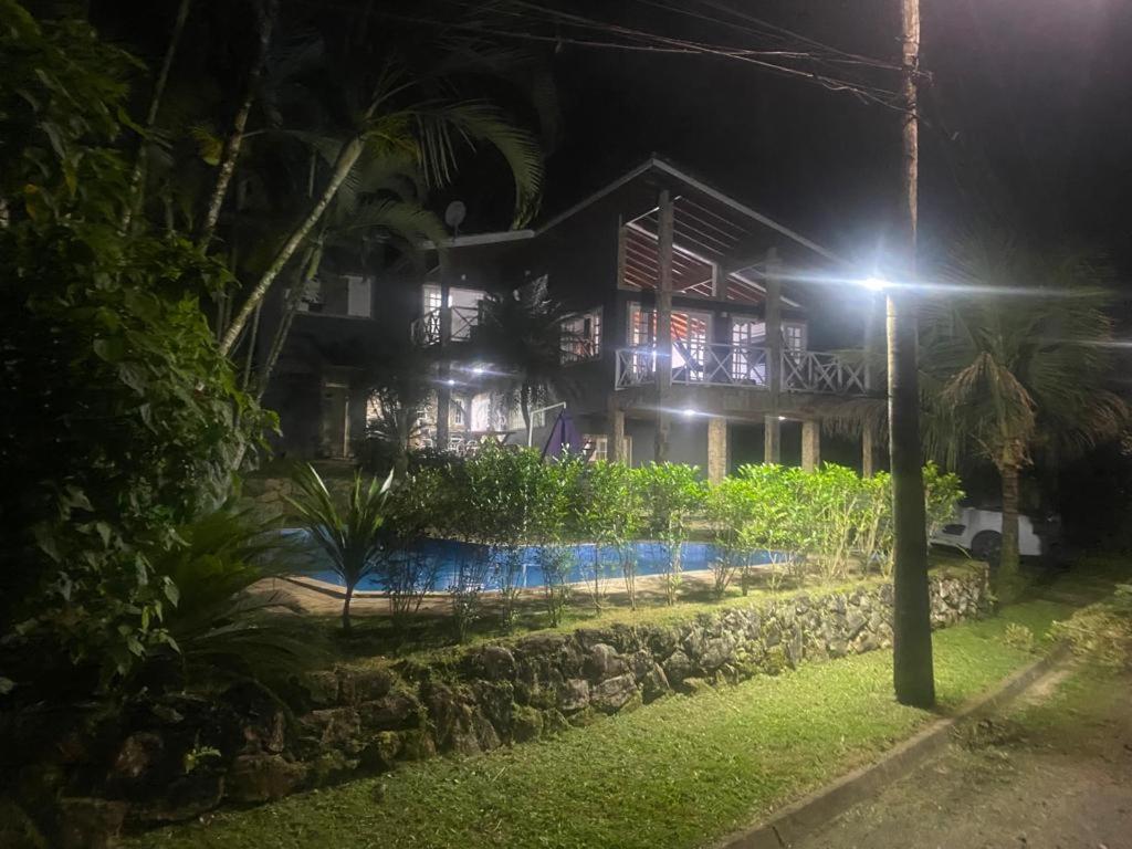 a house at night with a street light at Casa Park Imperial 