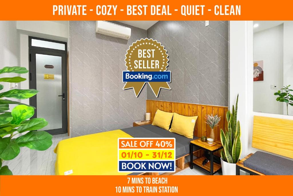 a catalogue of a bedroom with a yellow bed and signs at FSTAY - COZY AND PEACEFUL HOMESTAY DA NANG in Da Nang