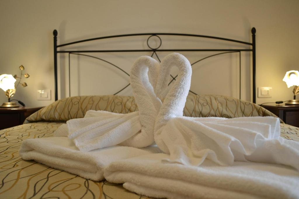 Postel nebo postele na pokoji v ubytování B&B Castiglione