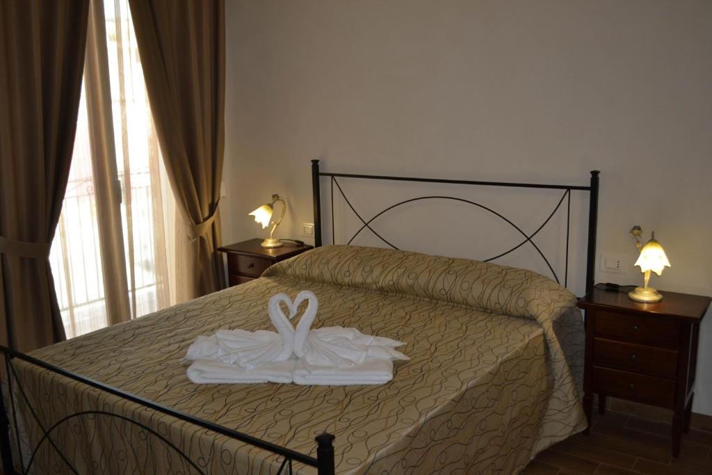 Postel nebo postele na pokoji v ubytování B&B Castiglione