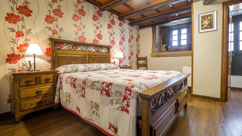Postel nebo postele na pokoji v ubytování Casa de los Somoza