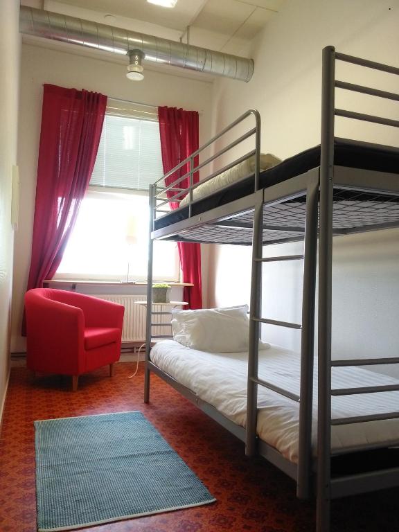 Postel nebo postele na pokoji v ubytování Gafsele Lappland Hostel