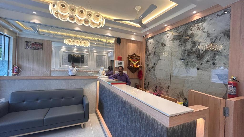 Χώρος καθιστικού στο Hotel Suvidha Residency