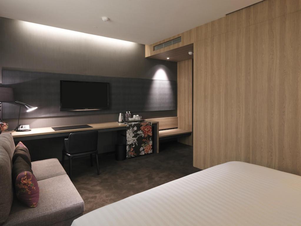 Postel nebo postele na pokoji v ubytování Hotel Dùa