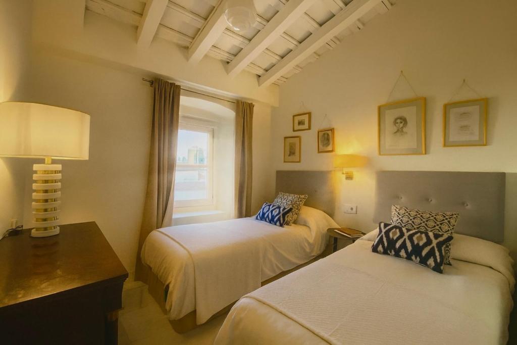 Ένα ή περισσότερα κρεβάτια σε δωμάτιο στο La Bohéme