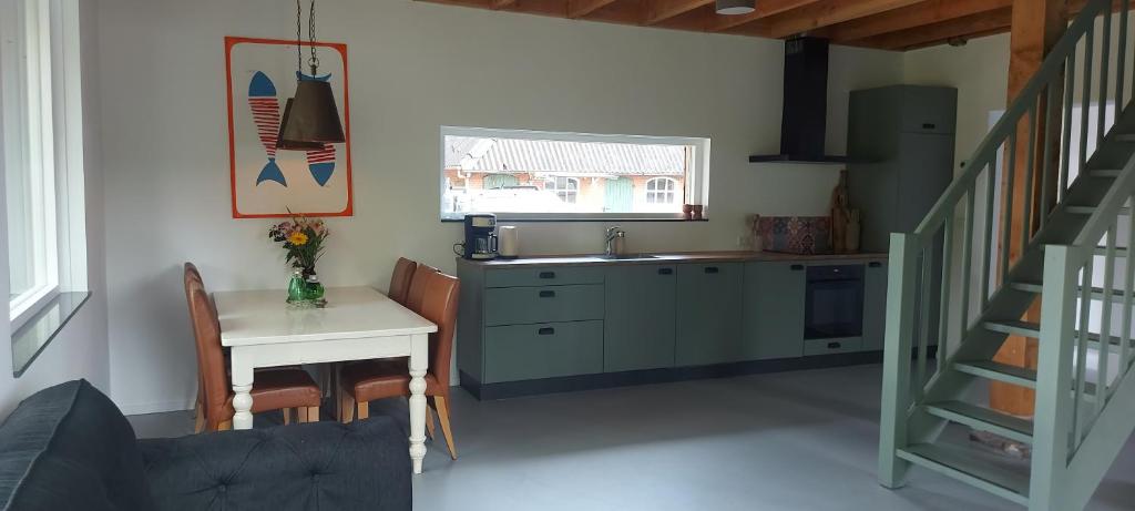 Kuchyň nebo kuchyňský kout v ubytování Vakantiehuis met prachtig uitzicht