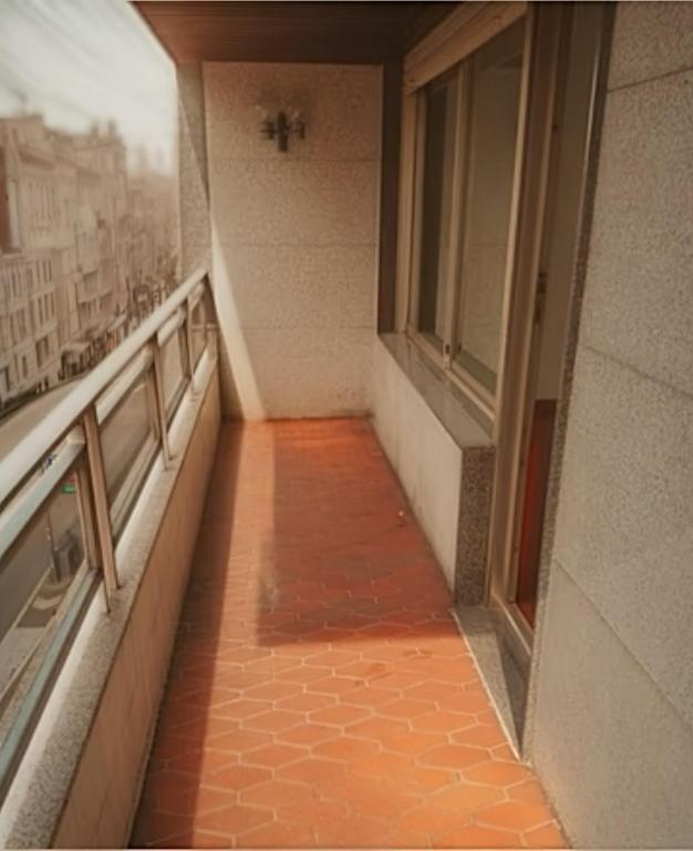 a hallway of a building with a view of a city at Vigo Central Retreat in Vigo