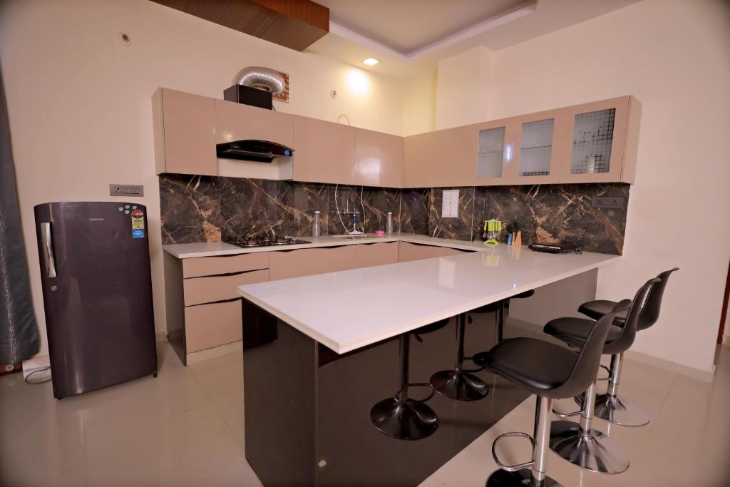 Køkken eller tekøkken på Uptown Jaipur - Luxury Apartments