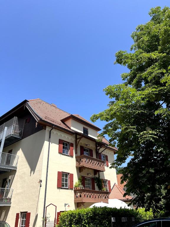 a large building with balconies on the side of it at Apartment Siggi 81 sqm Balcony and Mountain View in Siegsdorf