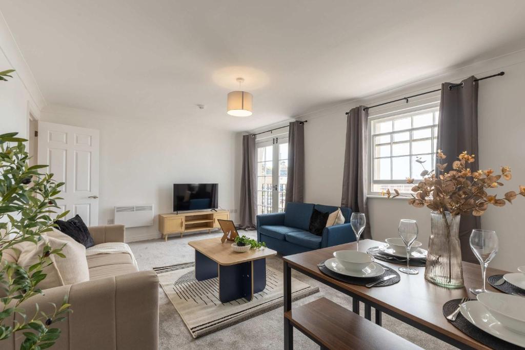 Televiisor ja/või meelelahutuskeskus majutusasutuses Fabulous 1 Bed Harbour-side Apartment with Balcony