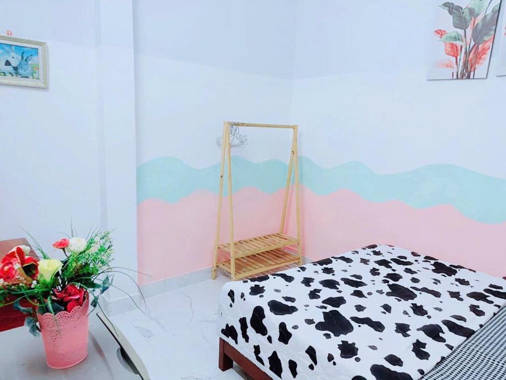 Ένα ή περισσότερα κρεβάτια σε δωμάτιο στο Rose Homestay