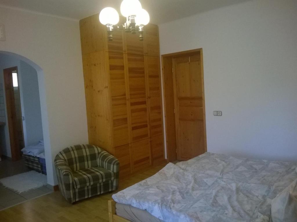 Posteľ alebo postele v izbe v ubytovaní Apartman Németh