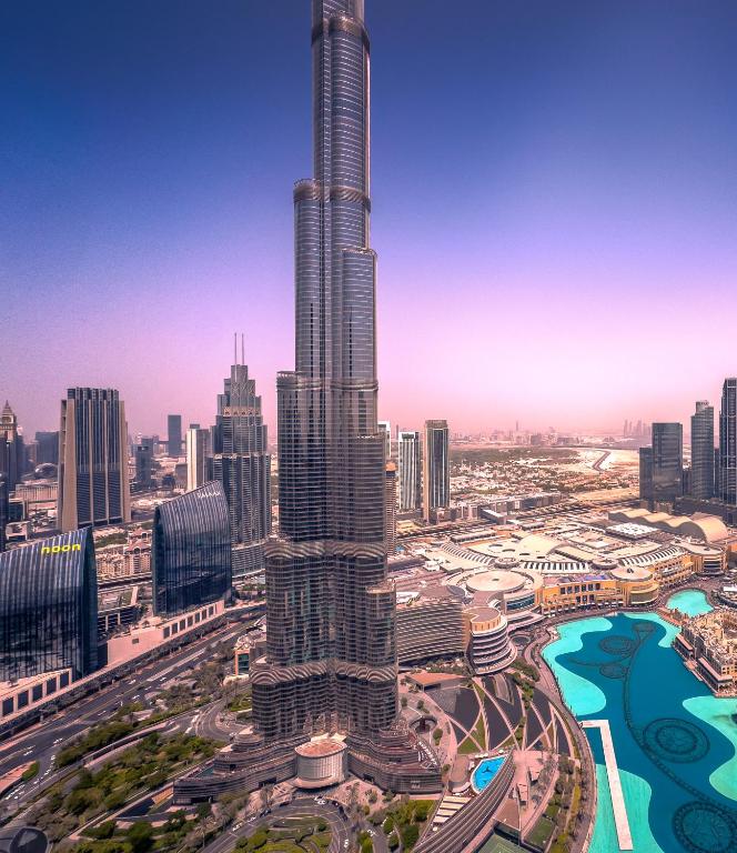 GRANDE RESIDENCES with a direct Burj Khalifa view and Private Fountain Show at 62nd floor with DXB AIRPORT VIP Shuttle option for 8 guests