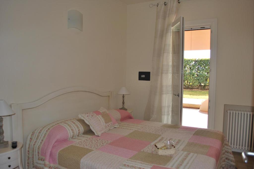 Postel nebo postele na pokoji v ubytování B&B Villa Bianca