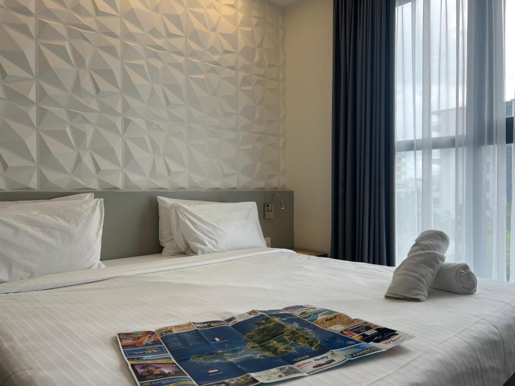 Postel nebo postele na pokoji v ubytování Adonis Cupecoy