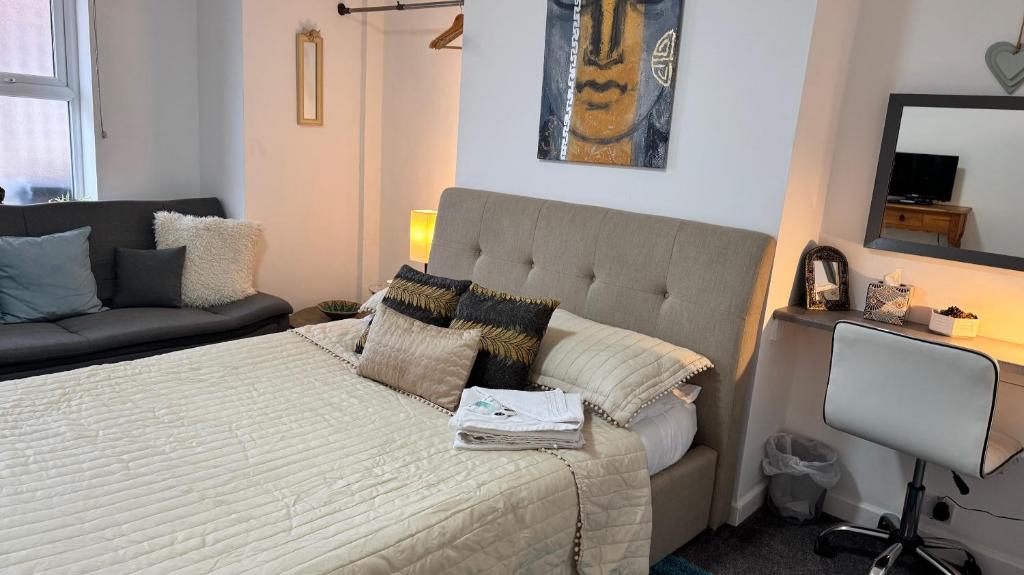 Ένα ή περισσότερα κρεβάτια σε δωμάτιο στο Sobo Studios