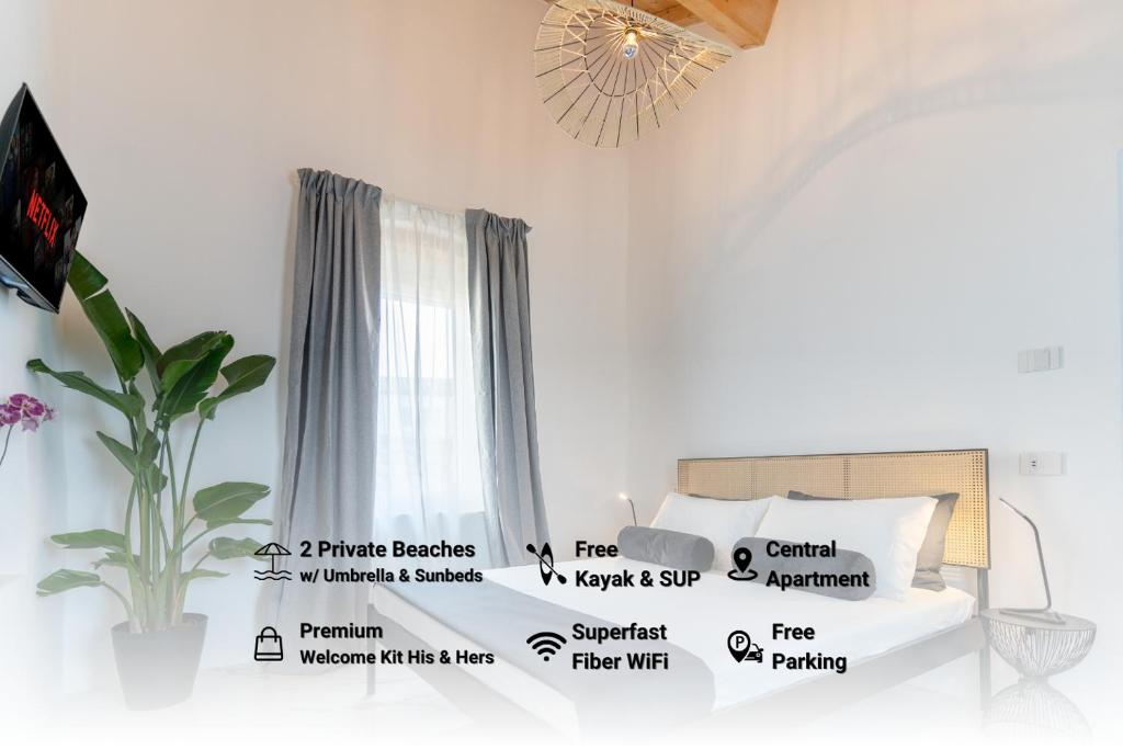 a bedroom with a bed with signs on it at Eleganza nel '700e comfort contemporaneo - ag3 in Bardolino