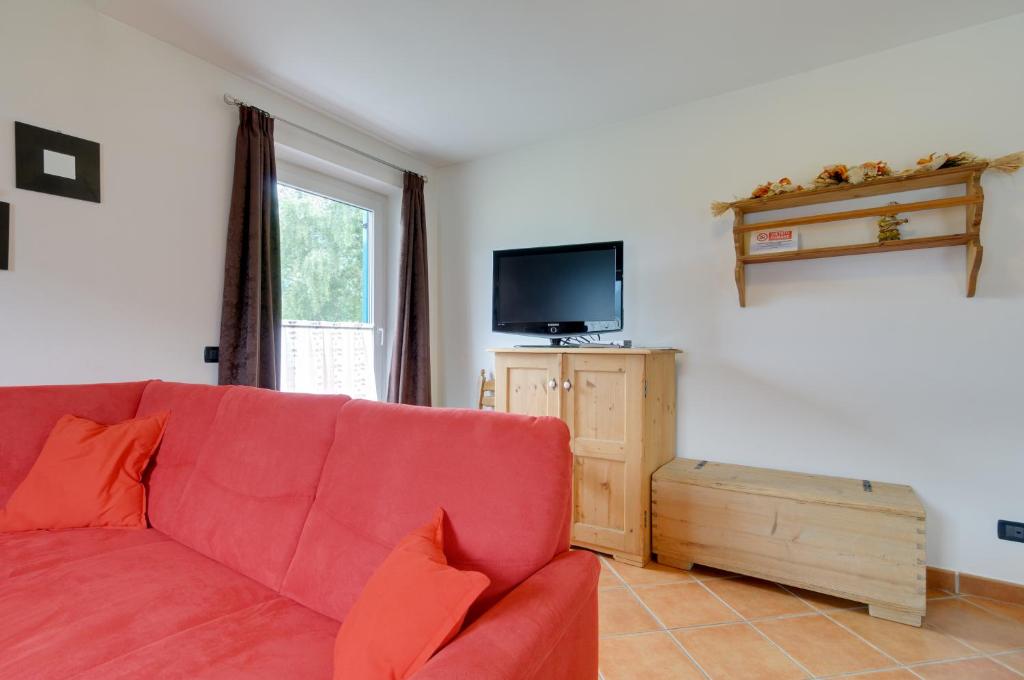TV a/nebo společenská místnost v ubytování Roe Apartment