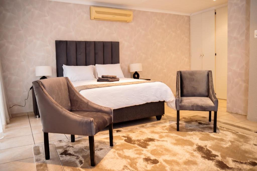 Ένα ή περισσότερα κρεβάτια σε δωμάτιο στο Home Away Haven