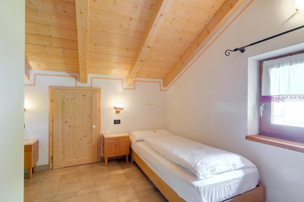 Postel nebo postele na pokoji v ubytování Roe Apartment