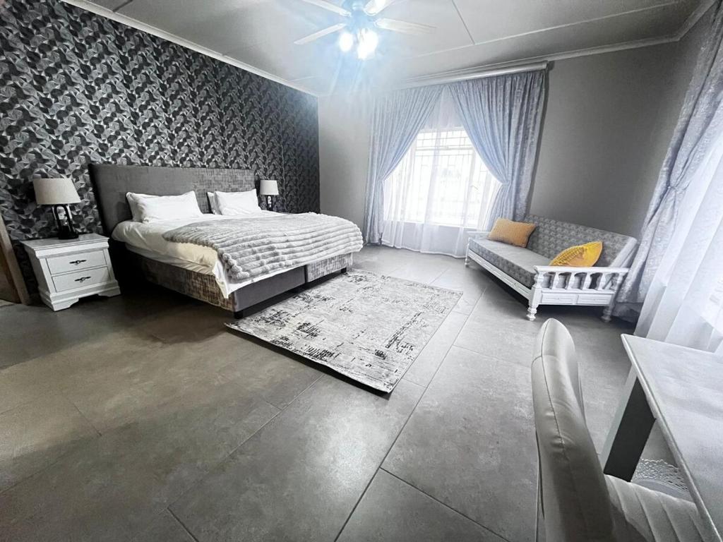 Postel nebo postele na pokoji v ubytování The Bloemhof Stay