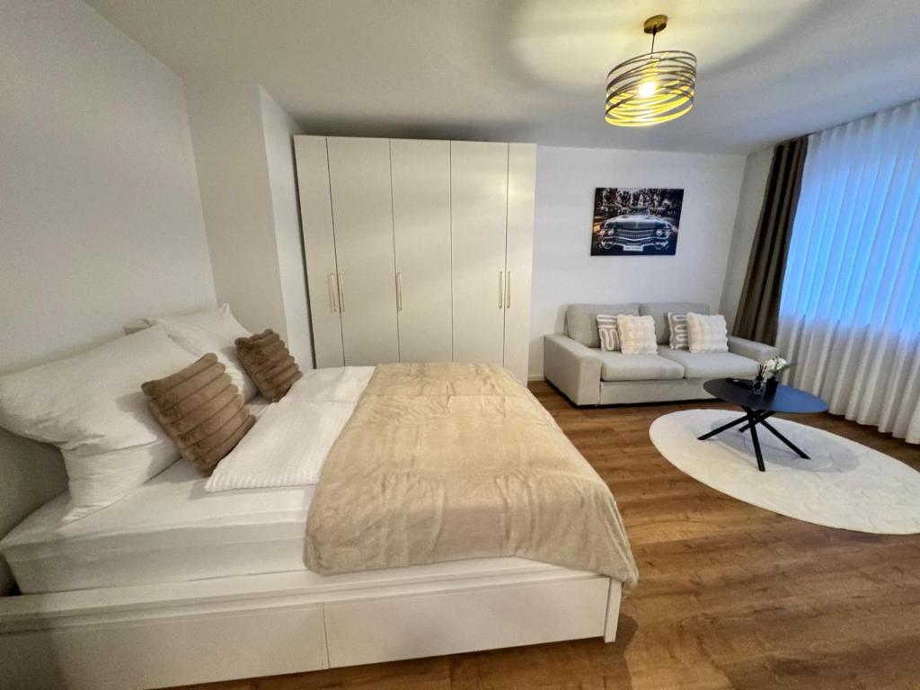 Ένα ή περισσότερα κρεβάτια σε δωμάτιο στο Modern City Apartment 3